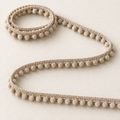 Lichtbeige mini bolletjesband van 5 mm voor kleding en decoratieve naaiprojecten