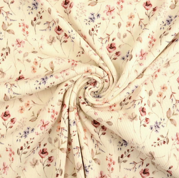 Gedrapeerde crèmekleurige rib jersey met zachte bloemenprint en fijne ribstructuur