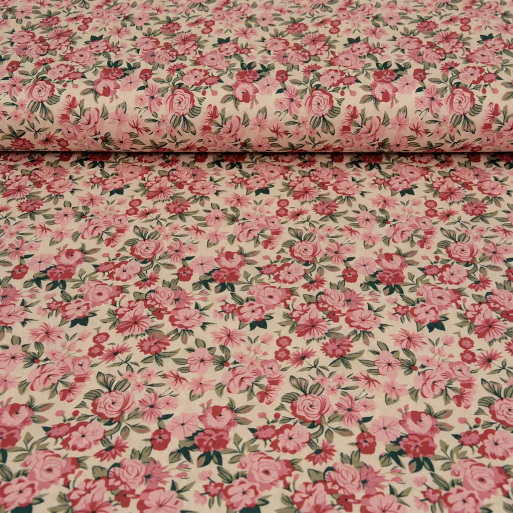 Viscose Yara met roze bloemenprint op ecru achtergrond